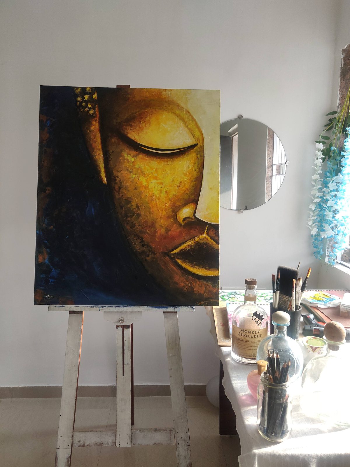 Hiral Prajapati's canvas artwork on an easel